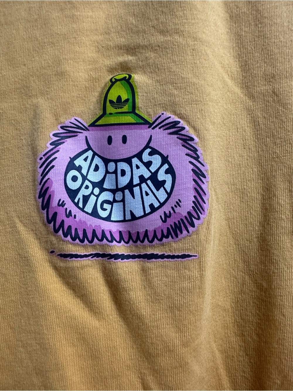 adidas Originals Yellow Tee with Pink Mascot and Green Cap